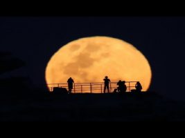 Why Do the Sun and Moon Get Bigger Near the Horizon?