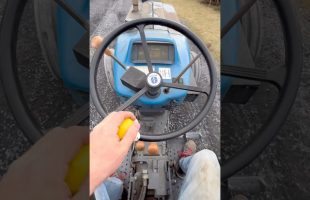 Using a Ford 3930 with a Homemade Box Scraper to Grade Up a Parking Lot