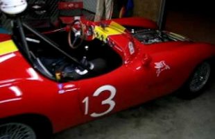 1957 Devin in race paddock at night