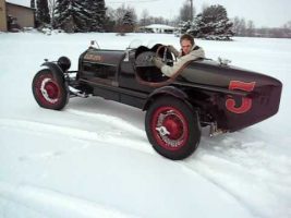 Snow driving in a 1929 Auburn race car