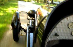 twisty road in a 1929 Auburn Indy race car
