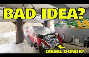 Removing a Teslas battery to replace with a diesel engine.