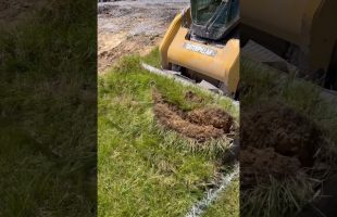Stripping Topsoil and Compacting Gravel to Build a Parking Lot