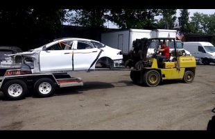 Removing Tesla Model S shell off of uhaul trailer